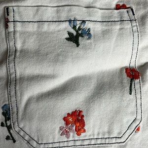 Meadows embroidered jeans.